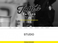Toms.tattoo